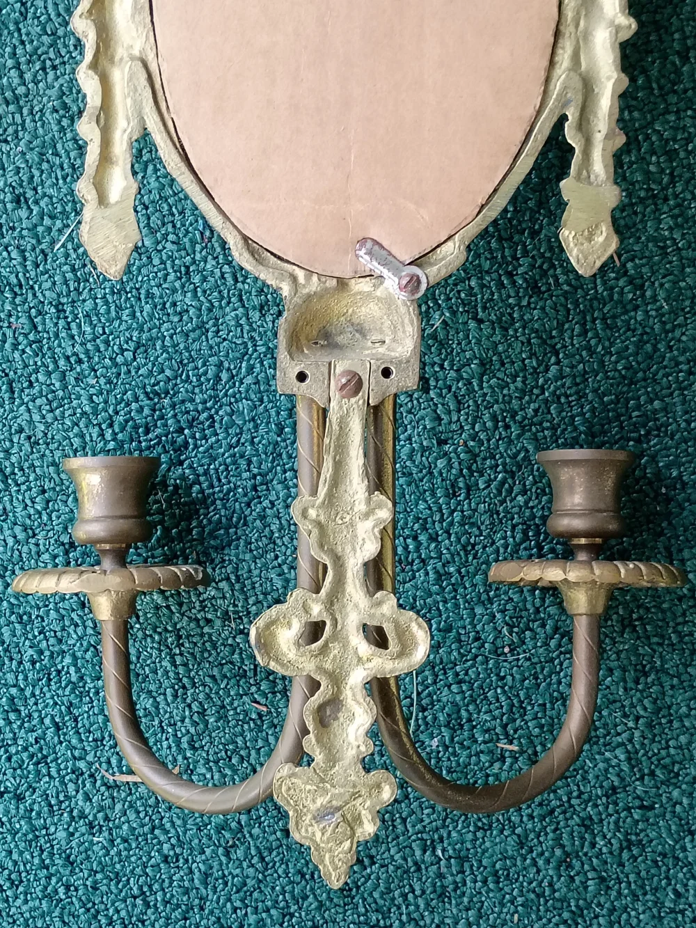 Ornate Gold Oval Wall Mirror with Twin Candle Holders